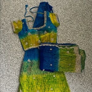 Vibrant Indian 3 piece set. Skirt, blouse & dupatta.